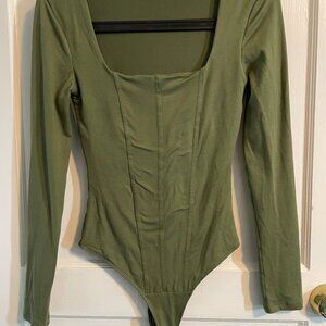 Green long-sleeve body suit